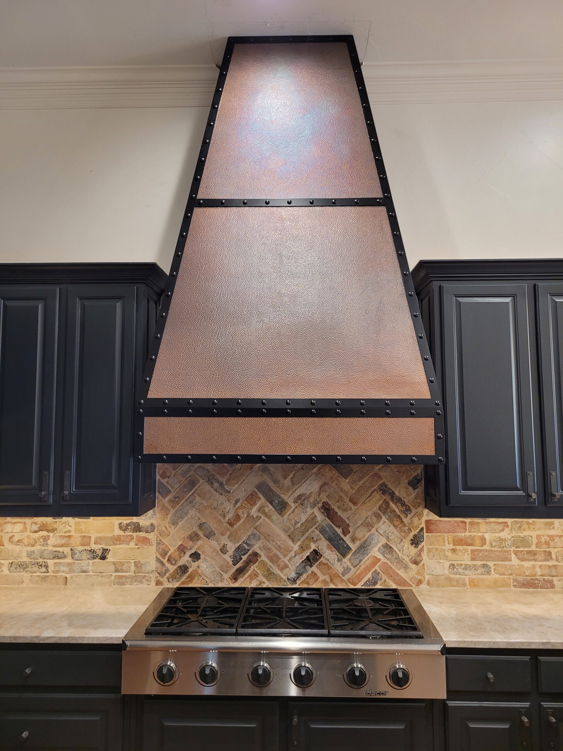 Deluxe Built metal fabrication copper vent hood