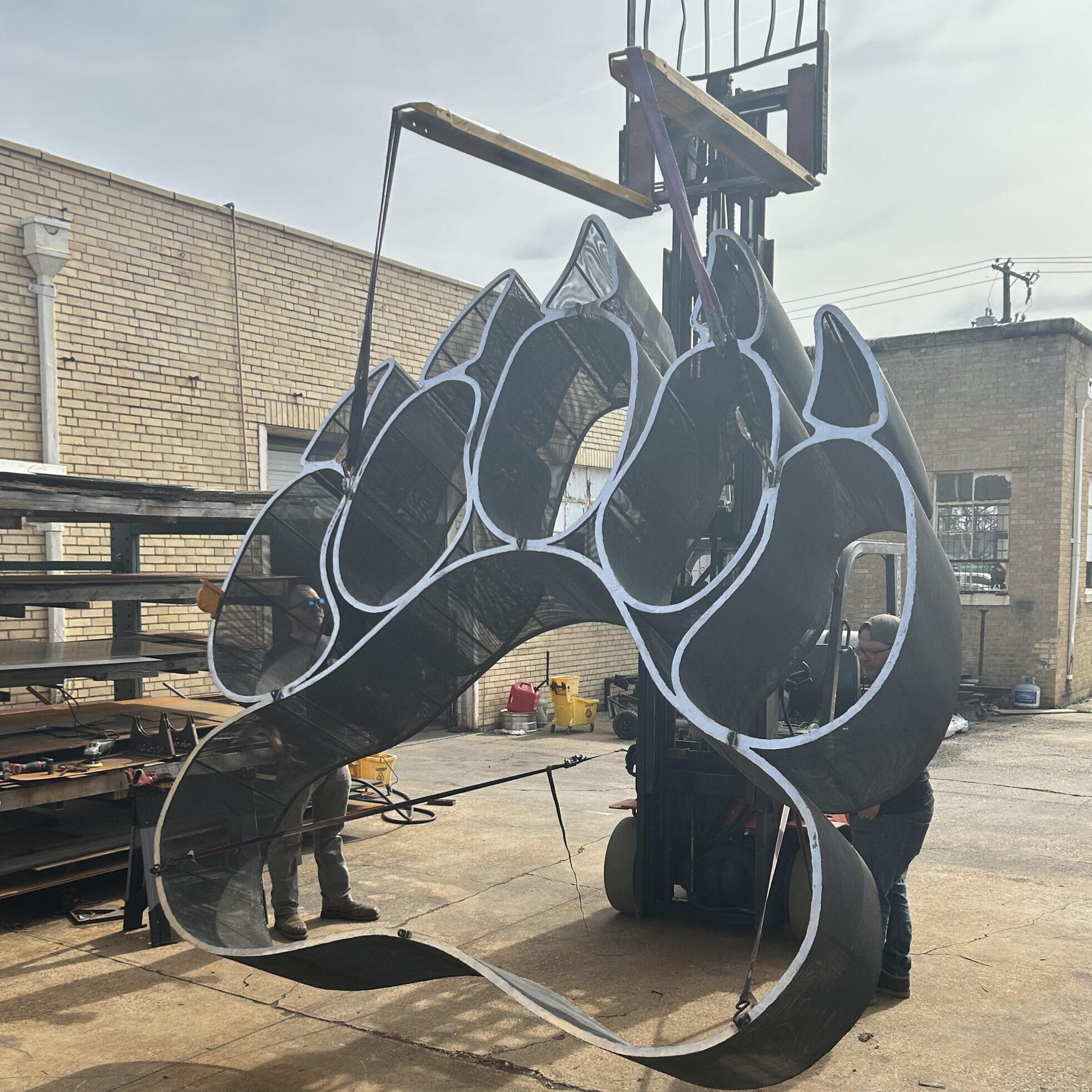 10' x 10' Custom metal giant paw sculpture
