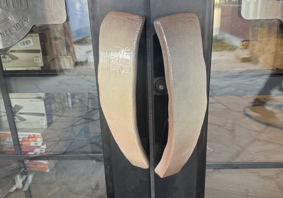 Custom fabricated steel beef rib front door handles